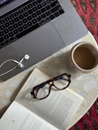 Laptop Glasses Book Coffee on table