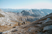 Destination elopement videographer documenting adventures with emotion in a remote wilderness setting.