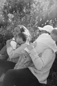Young family plays in Minnesota field