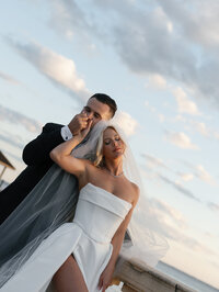 Bride and Groom posing on their wedding day at golden hour taken by Shelby Ann Photos, jacksonville wedding photographer