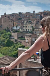 Woman looking out over Siena
