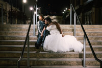 Couple hugging on stairs