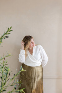 woman standing infront of wall