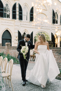 Bride and groom walk up memorial steps at their DC wedding