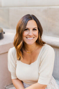 Woman smiling in photo to show creative web design and branding for entrepreneurs with Palme Design Co