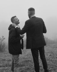Black and white photo of a couple laughing