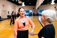 Couple working on dance routine during a ballroom dancing lesson at Dancers Studio.