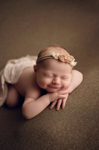 Newborn baby captured during a professional studio portrait session in Waukesha County, Wisconsin