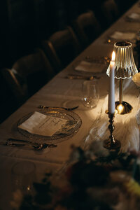 Candlelit wedding reception tablescape in Minnesota wedding
