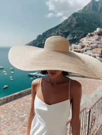 Prepared traveler in sun hat linking to essential health and safety travel advice. Tailored Oasis Travel Co.