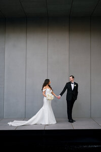 Bride and Groom Walking Together  with editorial feel