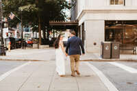 Chicago Field Museum Wedding with groom leading bride