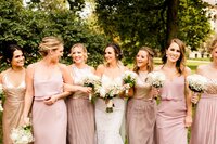 Bride and bridesmaids in mauve at lincoln park in chicago