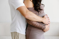 Close up of hands on belly of expecting mom with Indianapolis Maternity Photographer, Capturing Simplicity Photography