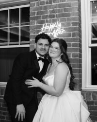 Industrial wedding photos at The Venues at the Factory featuring emotional portraits and unique architecture.