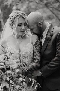 Chicago IL, bride and groom sitting in old house