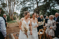 brides walking down the aisle after the ceremony
