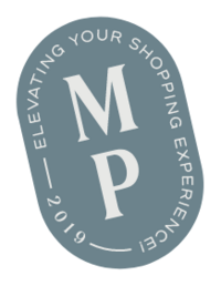 A blue oval shaped stamp with 'elevating your shopping experience 2019' outlining the inside of the shape with the letters 'M' 'P' filling the center vertically.