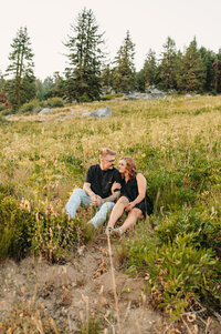 Couple Sitting in a Field | Photography by Jocelyn