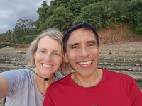 Lisa and Nayon Tomsio health coaches active hiking on beach