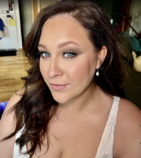 Wedding makeup client by Laura Duflo of Boho Glow Studio in Mankato, MN, with a natural yet glamorous look.
