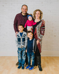 Portrait photographer's family taken at an indoor studio in Kaysville, Utah.