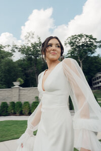 bride walking in a European styled garden