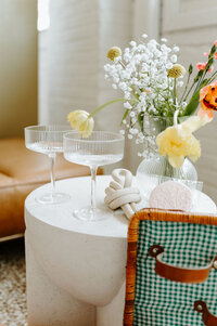 flowers and champagne coupes