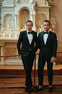 Will and Paul standing at luxury wedding