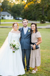 Eleanor Stenner with bride and groom at Birmingham wedding 