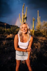 girl smiling in desert