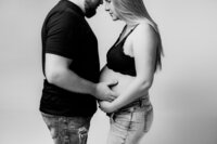 sunset maternity session with mother son and dad