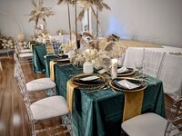 Elegant guest table inclusive  decor with rich velvet textures and boho flair - A luxurious and stylish setting for clearwater florida events.