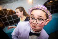 Picture of a Bar-Mitzvah Boy making a funny face at a Mitzvah Party