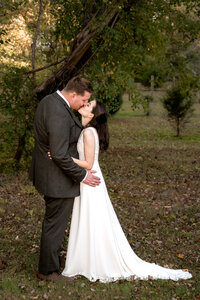 Bride & Groom Kissing in the Woods - Wedding Photography - Jennifer Mummert Photography