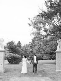 Couple in a park looking to the side, taken by baltimore wedding photographer Nicole Simensky