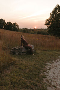 Pregnant woman during an outdoor maternity session in Michigan