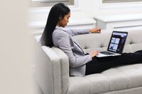 woman-with-laptop-on-couch