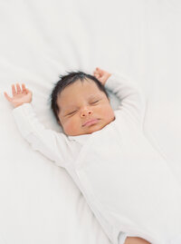 family in field smiling Denver Family Newborn Photographer