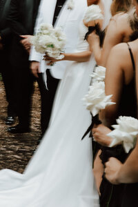 wedding details of bride and wedding party flowers