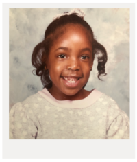 polaroid picture of a young black girl