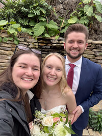 Desiree taking a selfie with an eloping couple.