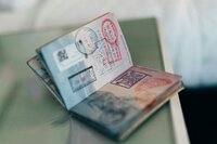 Open passport with lots of stamps