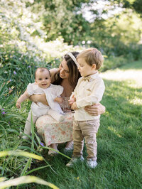 Candid outdoor family portrait showcasing work-life connection for Seattle wedding photographer Natalie Jayne by Ashley Cox Photography