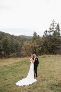 Couple cutting their cake on their wedding day.