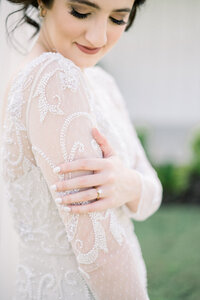 closeup of beaded detail of brides dress