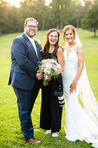 Eleanor Stenner with bride and groom at Birmingham wedding 