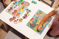 Preschooler hand playing a tracing game