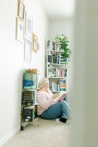 woman sitting in her home office