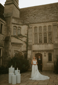 Editorial wedding dress hanging in moodyvenue window, cinematic film style